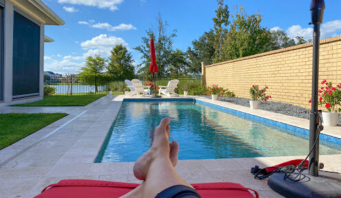 pool owner enjoys pool that has less energy use with a heat pump